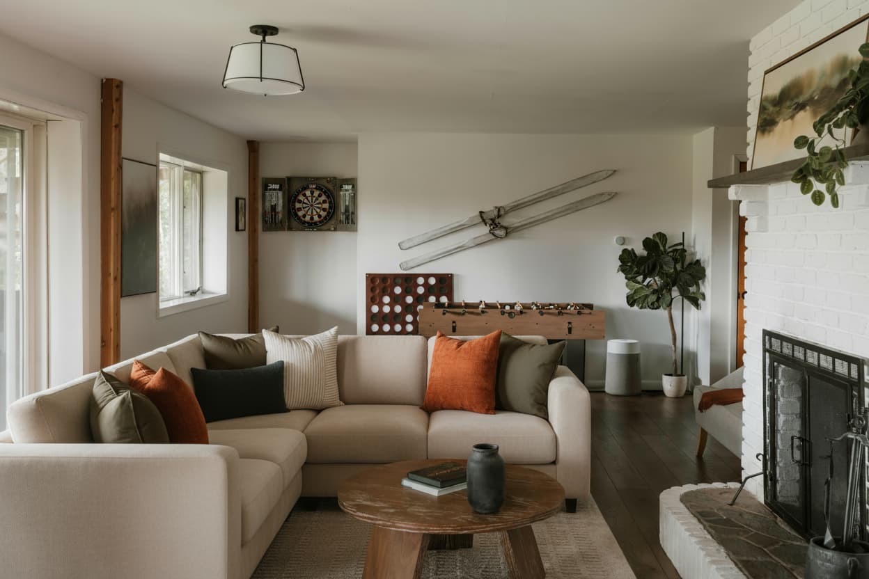Nano Banana Effect: Swap the current leather corner sofa for a low profile modern sectional in neutral beige boucle fabric. Add rounded edges and remove hard square lines. Keep the shadows and reflections consistent with the floor and coffee table.